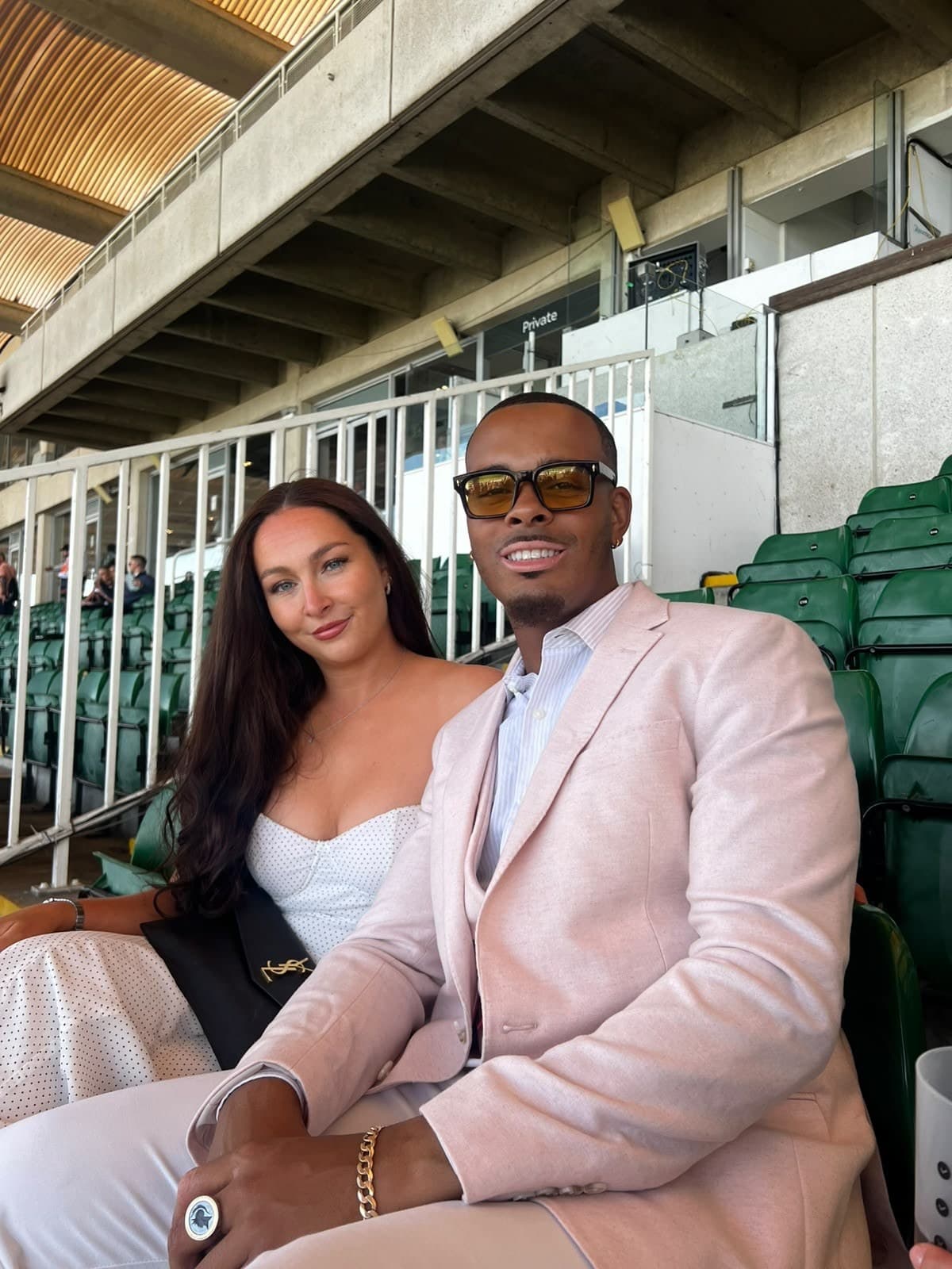 Georgia and Elijah in the stands at the races